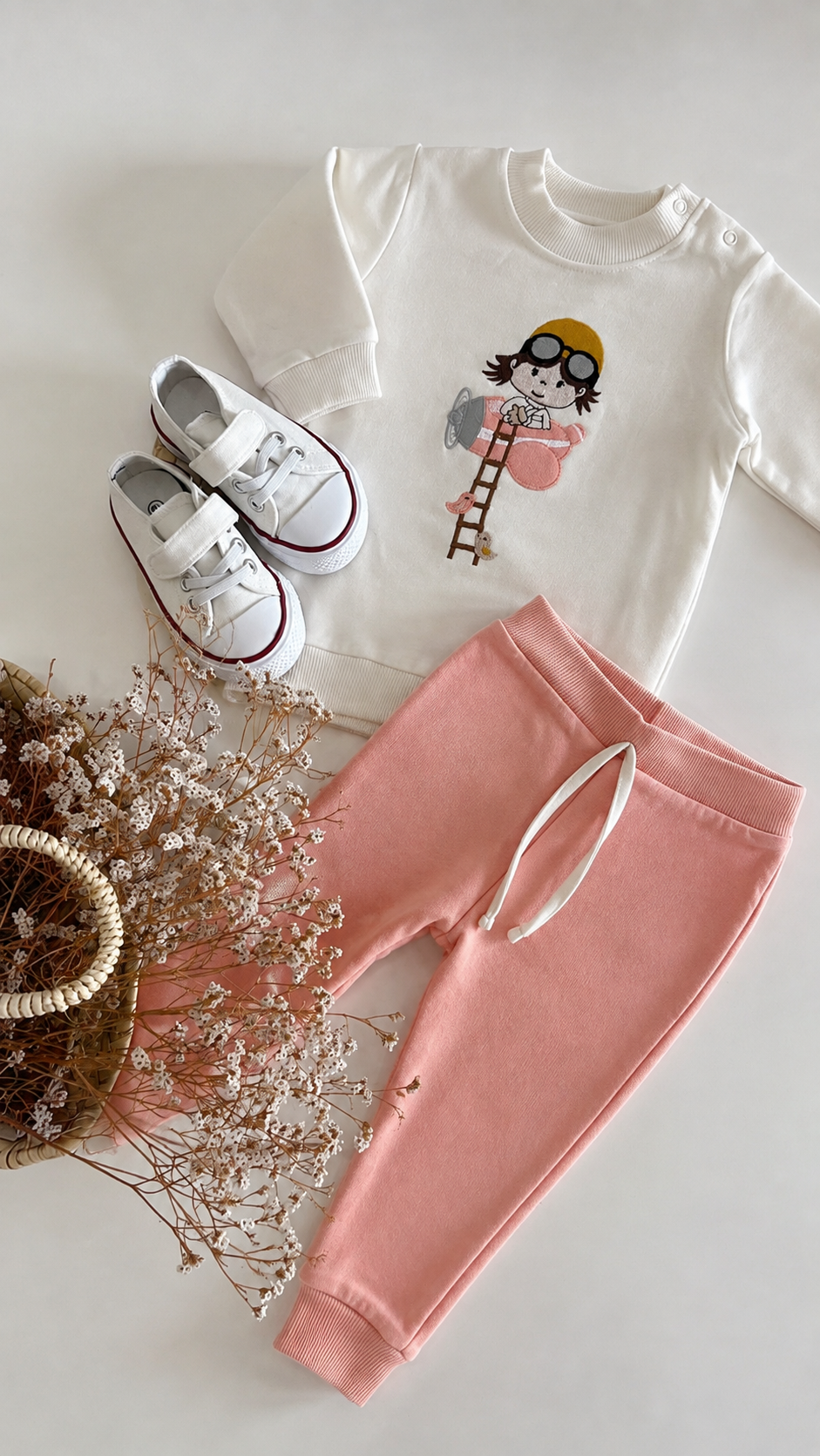 Chándal avioneta rosa